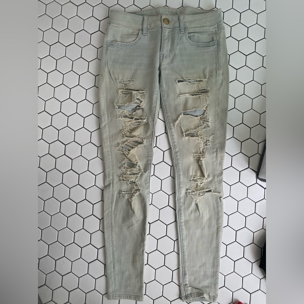 Faded ripped American Eagle Jeans